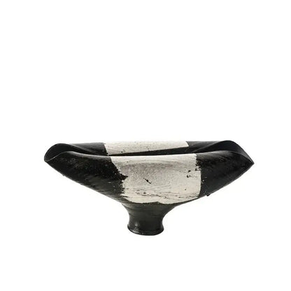 Black and white ceramic bowl with flared asymmetrical rim and textured glaze for decorbites elliptic resin flower pot use