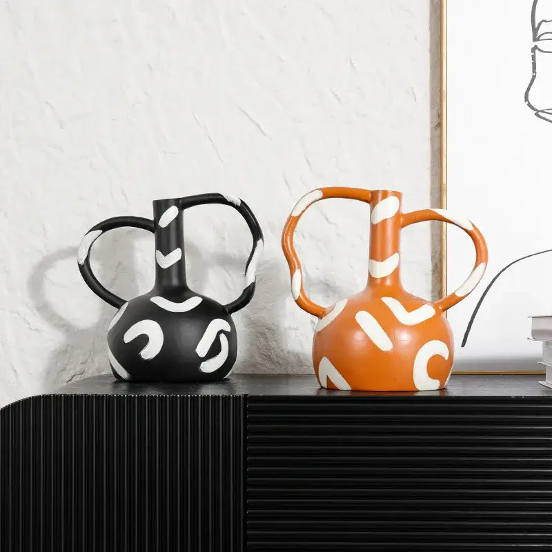 Abstract black and orange ceramic geometric striped vase with white patterns and dual abstract handle decorbites living room decor