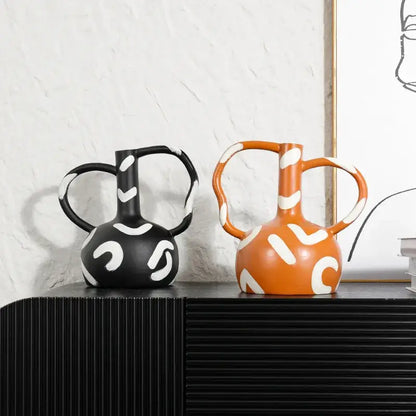 Abstract black and orange ceramic geometric striped vase with white patterns and dual abstract handle decorbites living room decor