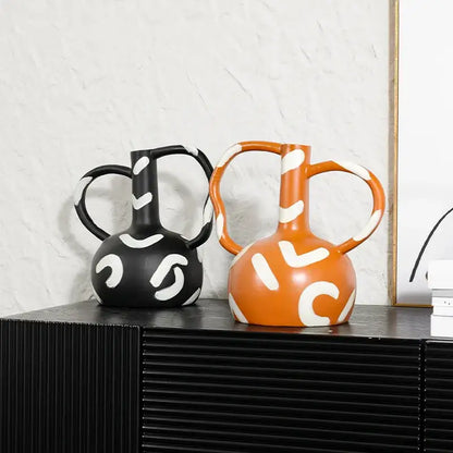 Black and orange ceramic geometric striped vase with white abstract handle decorbites for living room decor