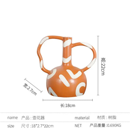 Orange ceramic geometric striped vase with abstract handle white patterns decorbites living room decor