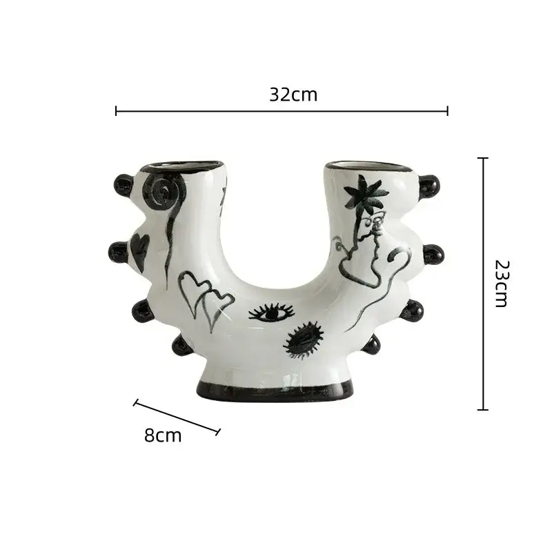White ceramic graffiti ceramic vase with black hand-painted eyes hearts and cat under palm tree for living room decorbites decor