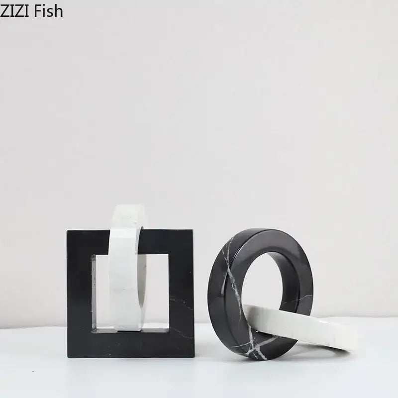 Black and white marble bookends with abstract square ring geometric knot design for modern living room decor