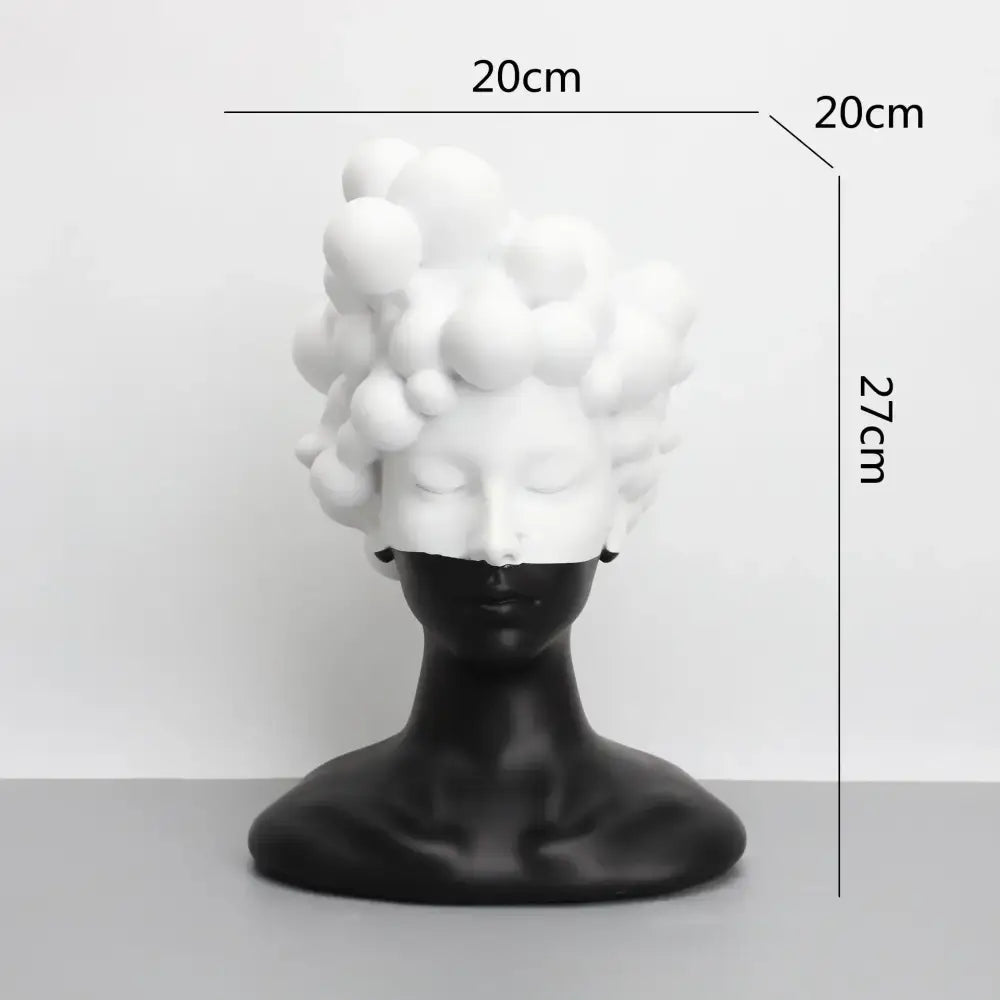 A sleek black and white woman figurine resin sculpture with voluminous bubble curls for abstract woman decorbites decor