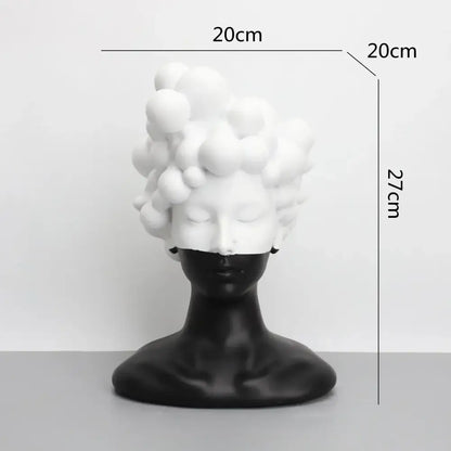 A sleek black and white woman figurine resin sculpture with voluminous bubble curls for abstract woman decorbites decor