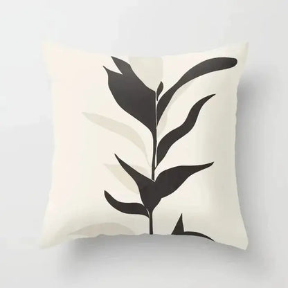 Cream-colored decorbites decorative pillowcase with minimalist black stylized plant for earthy living room decor