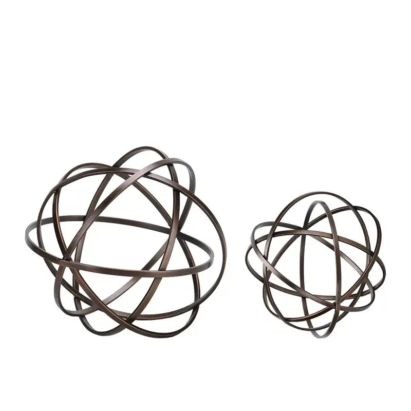 Abstract bronze geometric sphere pendant sculpture featuring metal wire spheres with interwoven circular bands for decor