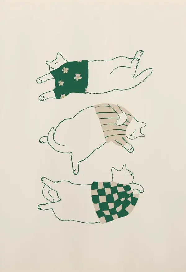 Illustration of three white lazy cats wearing green cream floral, beige stripes, and checkered garments on canvas wall art
