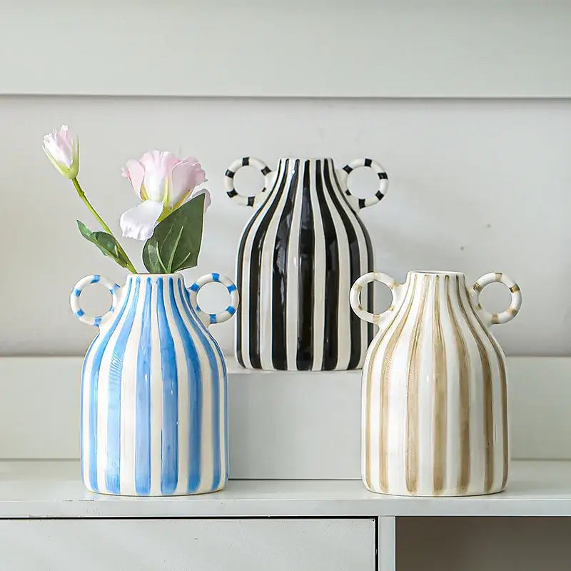 Blue and white striped abstract ceramic hydroponic vase with circular double ear handles for modern decor