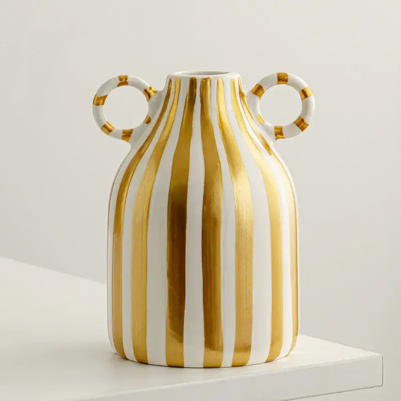 Abstract ceramic hydroponic vase in white ceramic with vertical gold stripes and double ear handles with gold bands