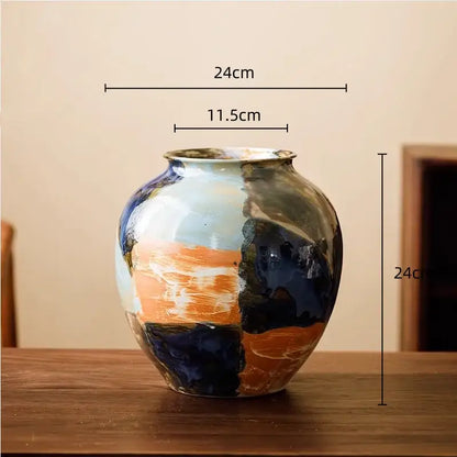 Abstract floral design hand-painted ceramic vase with glossy color stitching in deep blue orange and soft white for decorbites decor