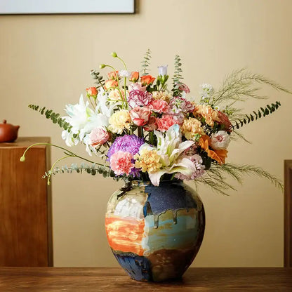 Abstract floral design hand-painted ceramic vase with color stitching sunset glazes holding vibrant mixed flower decorbites decor