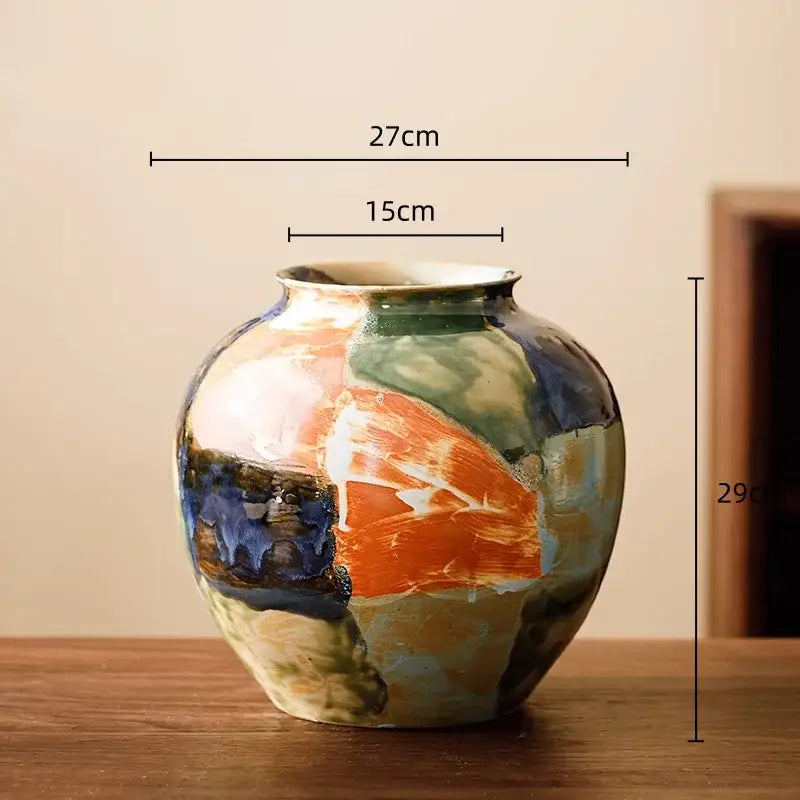 Abstract floral design hand-painted ceramic vase with glossy color stitching in orange green blue and beige for decorbites decor