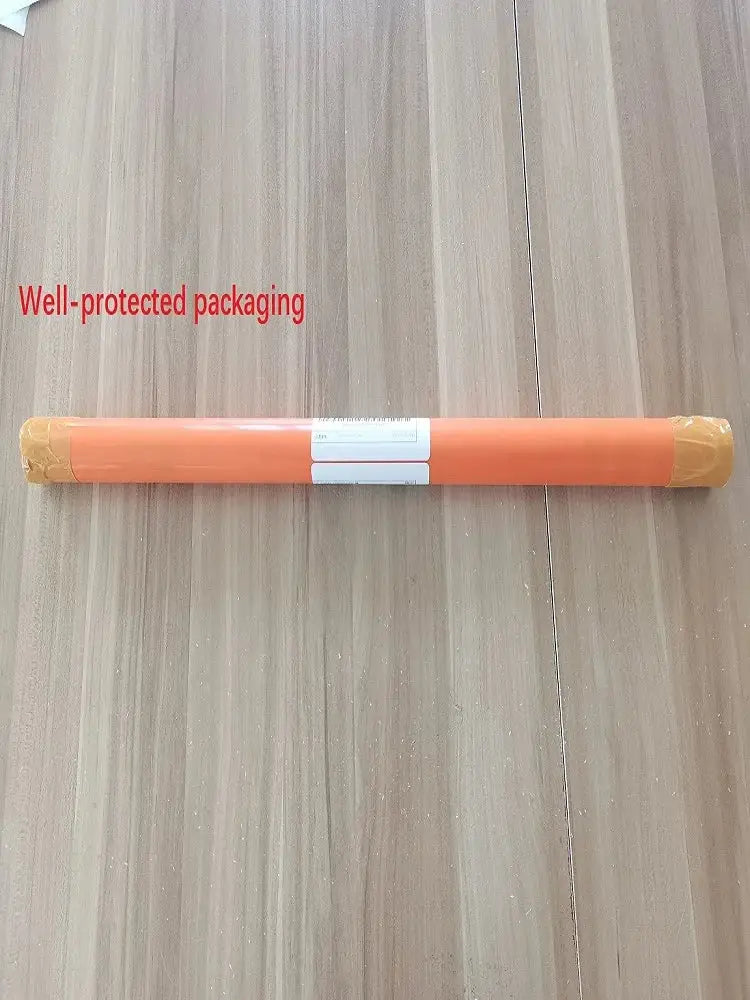 Orange cylindrical package with taped ends and white label containing decorbites™ abstract beige japanese flower canvas wall art wrapped in protective material