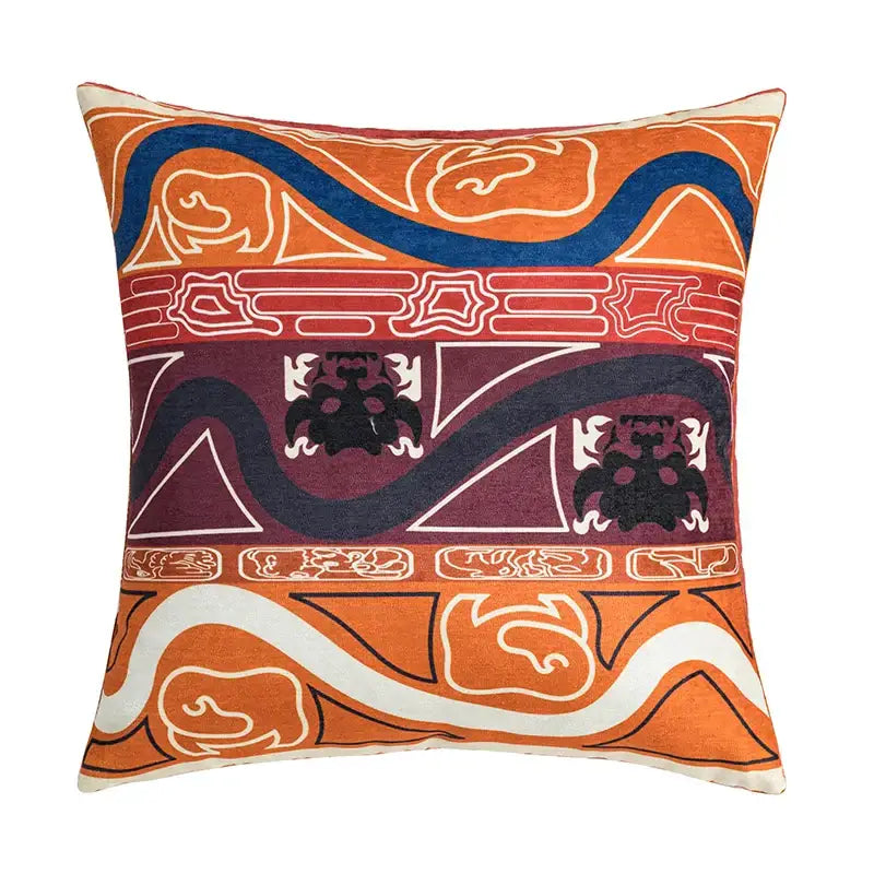 Vibrant orange and maroon cushion cover with bold geometric and stylized animal motifs for decorbites abstract geometric decor