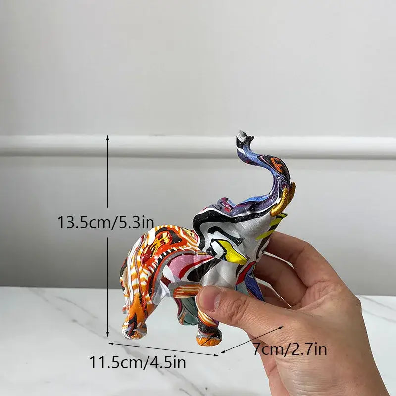 A vibrant multicolored abstract geometric elephant resin art statue with a glossy finish for living room decorbites elephant resin decor
