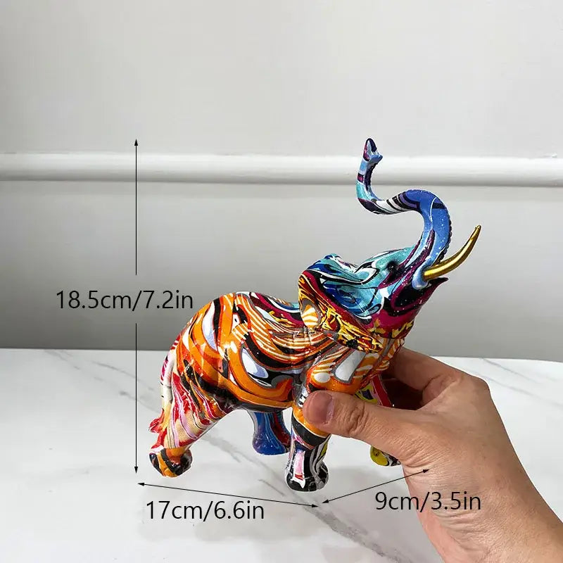 Vibrant abstract geometric elephant resin art statue with swirling orange blue gold and purple decorbites elephant resin decor
