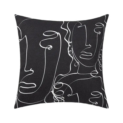 Black square pillow cover with abstract geometric print featuring white stylized faces for living room decorbites decor