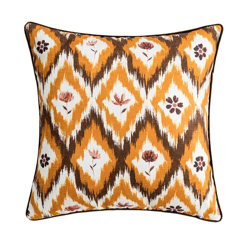 Square cushion cover with bold orange brown and white ikat stylized floral pattern decorbites abstract geometric decor