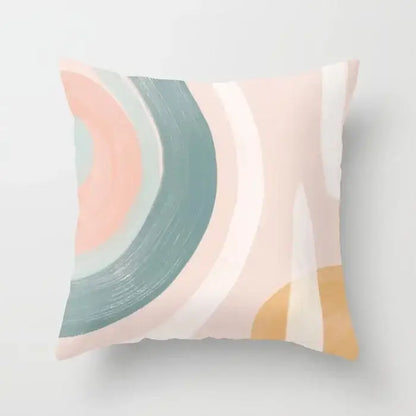 Rectangular pillow cover with decorbites geometric stitch print featuring pastel peach teal cream and mustard arcs for decor
