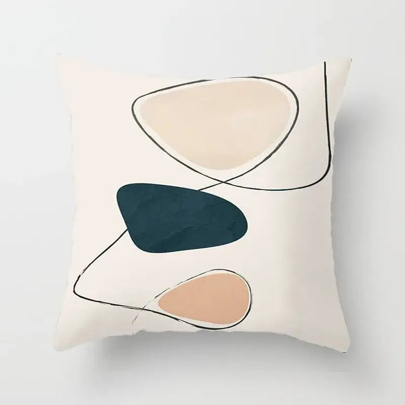 Cream-colored pillow cover with abstract geometric stitch print in beige, muted teal, and dusty rose for decorbites decor