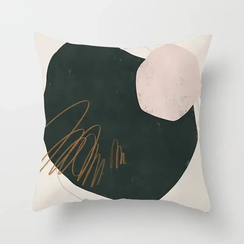 Cream-colored pillow cover with decorbites geometric stitch featuring black shape pink circle and gold brushstroke accents