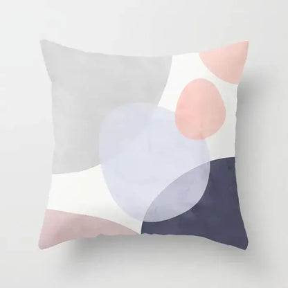 Abstract geometric stitch print pillow cover featuring overlapping pastel pink gray and navy circles for living room decorbites decor