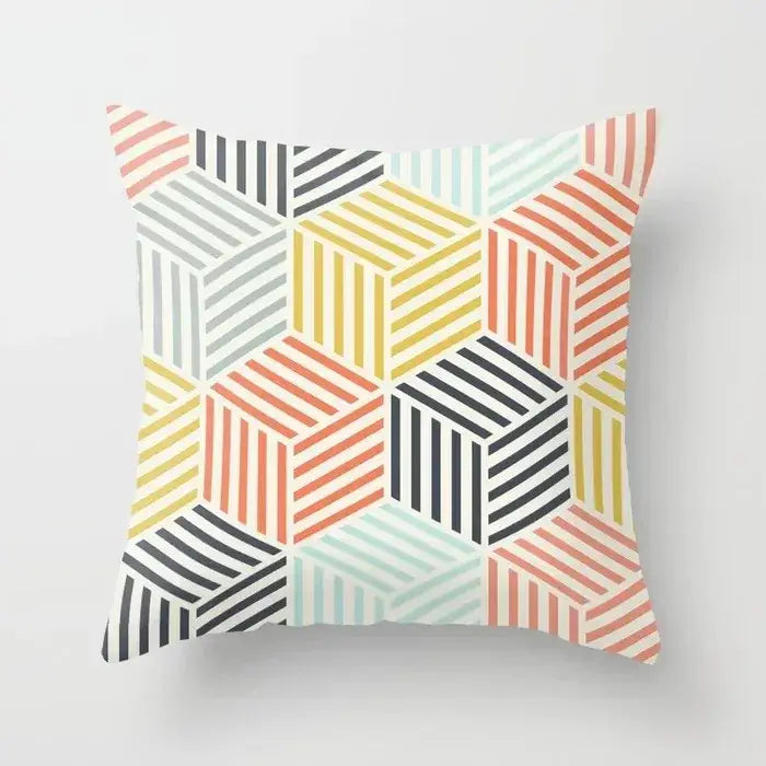 A square pillow cover with a decorbites geometric stitch print of vibrant pastel and bold interlocking cubes