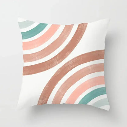 A square throw pillow cover with abstract geometric stitch print in peach, muted teal, and white for living room decorbites decor