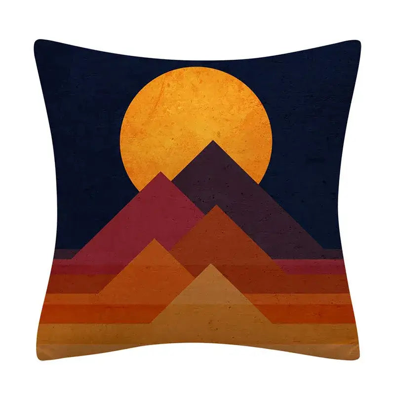 Square cushion cover with decorbites geometry pattern featuring a stylized sunset in warm hues on navy background