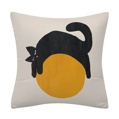 Cream-colored cushion cover with decorbites geometry pattern featuring a black cat silhouette and yellow circle background