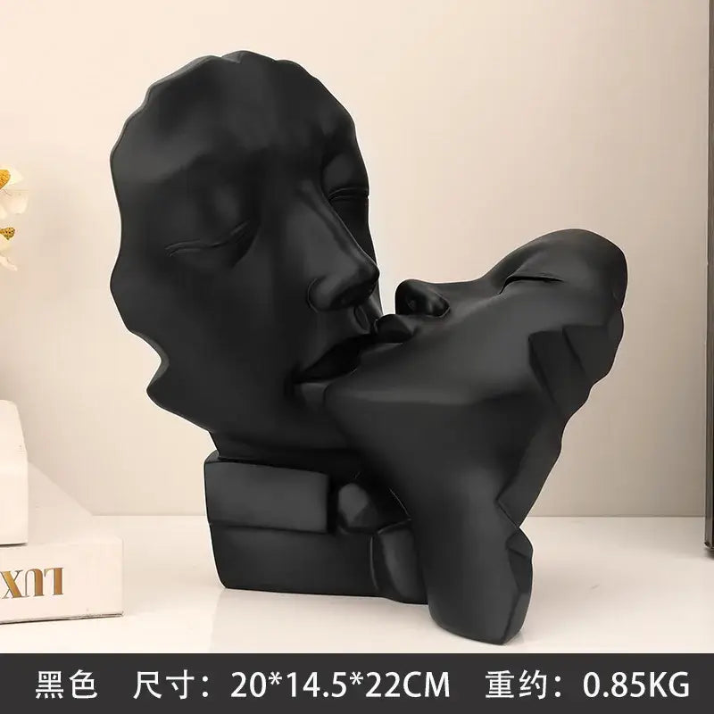 Black matte resin sculpture of abstract gold head couple in kissing pose for living room decorbites abstract gold decor