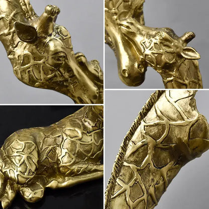 Golden brass abstract resin giraffe figurine with detailed textured skin and polished finish for living room decorbites decor