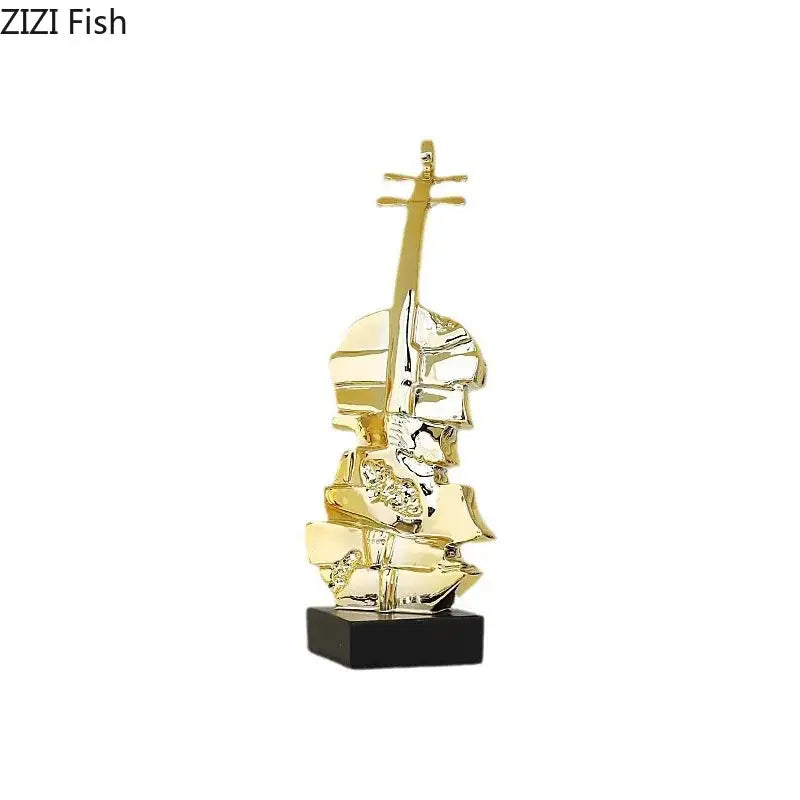 Golden violin sculpture with glossy metallic finish on black base decorbites golden violin for living room decor