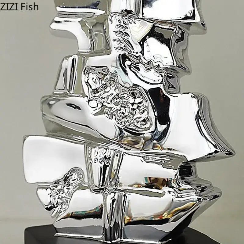 Shiny silver abstract violin sculpture with reflective layered geometric forms for living room decorbites decorbites golden violin