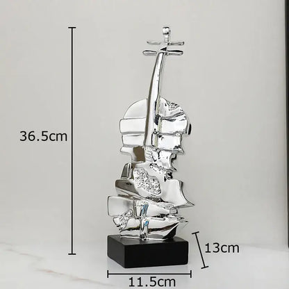 Shiny silver abstract violin sculpture on black base for living room table decorbites golden violin sculpture