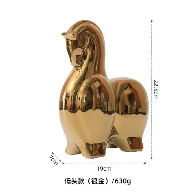 Gold resin statue of a golden-plated ceramic low-headed ram 22.5cm tall for elegant living room decor