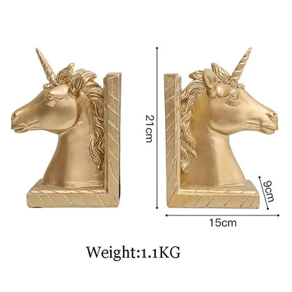 Golden unicorn head bookends with detailed mane and horn crafted in metallic gold resin statue for living room decor