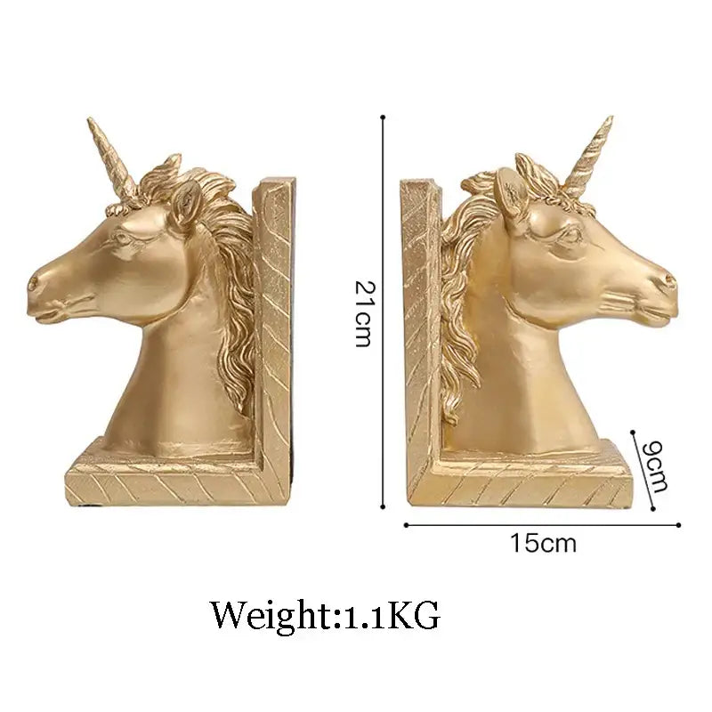 Golden unicorn head bookends with detailed mane and horn crafted in metallic gold resin statue for living room decor