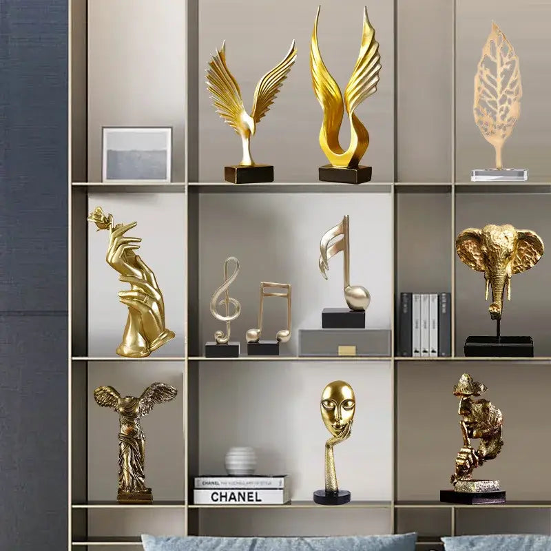 Abstract golden eagle resin statue with a sleek gold resin finish and black base for living room decor