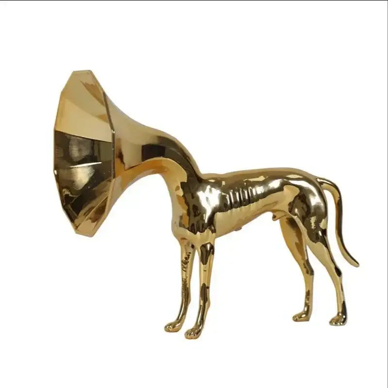 Abstract golden trumpet dog sculpture featuring a golden metallic figurine with a gramophone horn head for living room decor