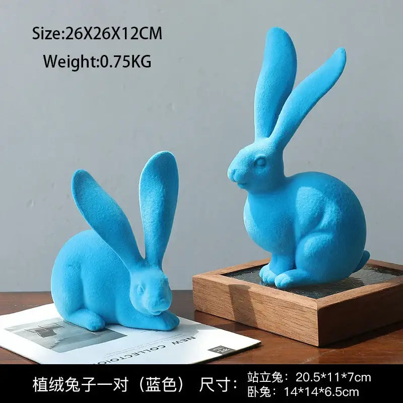A pair of blue plush abstract rabbit figurines, one standing and one sitting, for living room resin decor art