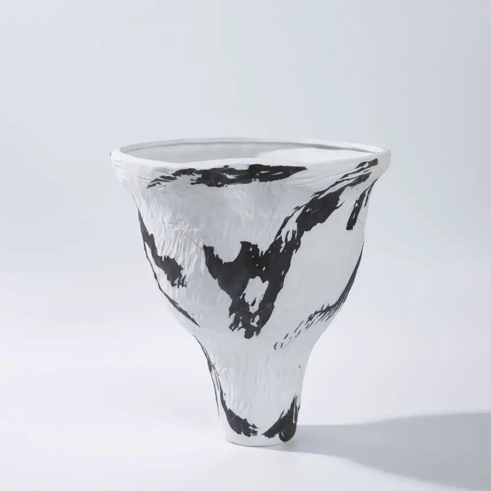 A white ceramic vase with bold black brushstroke patterns and textured surface from decorbites abstract irregular vase set for living room decor