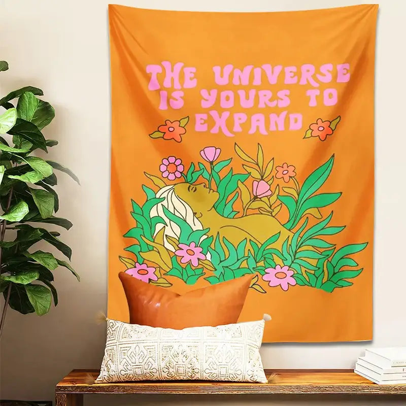 Orange abstract landscape flower tapestry featuring a person with flowers and pink text for bedroom decorbites decor