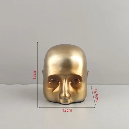 Abstract minimalist golden head half face sculpture with smooth metallic finish for home decor by decorbites golden head
