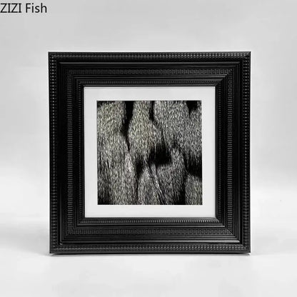 Black ornate picture frame with beaded border holding black and white fur photo for decorbites abstract modern wall art