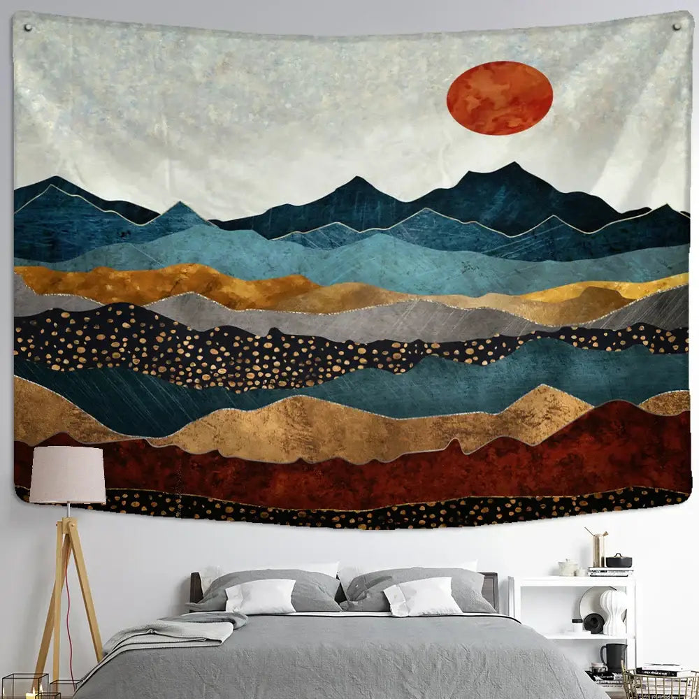 A textured wall hanging with abstract mountains oil painting in blue gold and red featuring a stylized orange sun