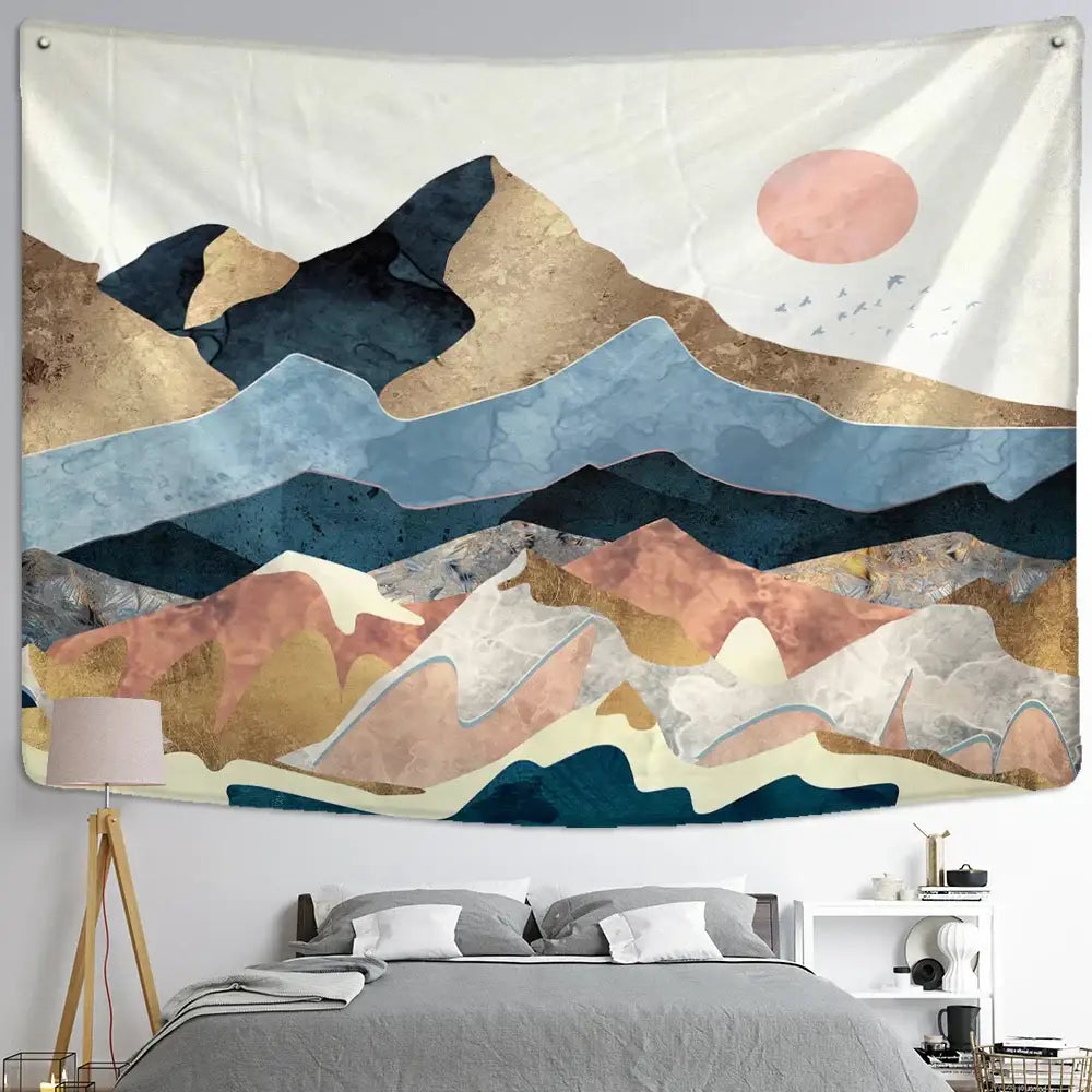 A modern abstract mountains oil painting wall hanging with layered navy gold and rose peaks and a soft pink sun on off-white