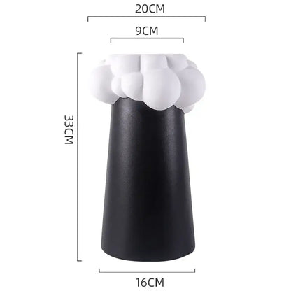 Black ceramic vase with white cloud-like textured top abstract patchwork ceramic decorbites abstract patchwork decor