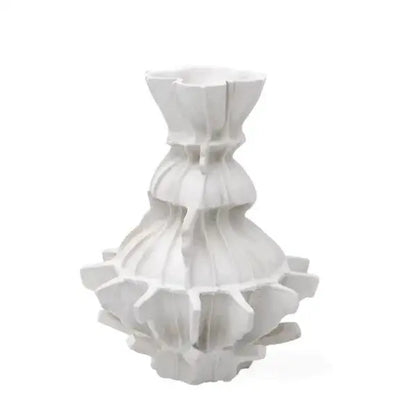 White ceramic abstract pleated gear vase with layered petal-like ridges and fluted top for living room decor